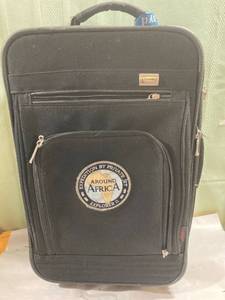 lot 7981 image: Carry-on suitcase 20 x 13
