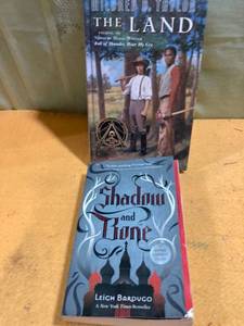 lot 9705 image: Books shadow and bone and the land