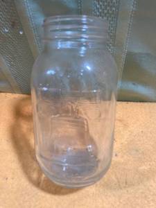 lot 9719 image: (8) 1 quart mason jars with lids and rings