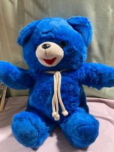 lot 9882 image: Seated blue 16 inch bear for Easter