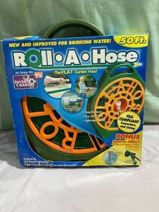 lot 9953 image: Roll a hose The flat garden hose as seen on TV never used