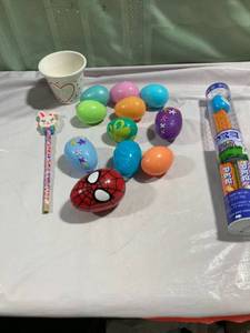 lot 9993 image: Easter eggs, PEZ,pencil. eat