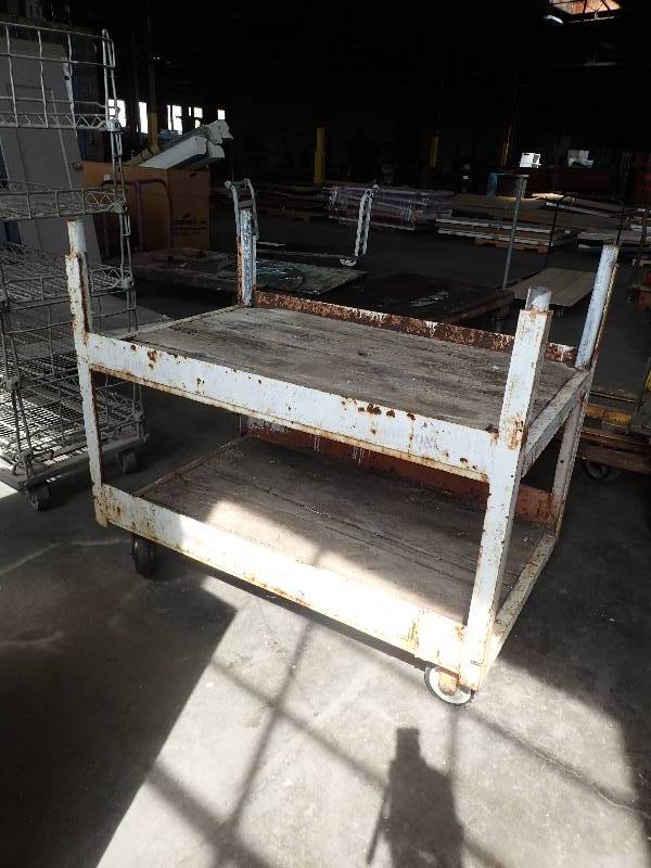 lot 2647 image: 2 Tier Metal Wood Base Heavy Duty Cart on Casters