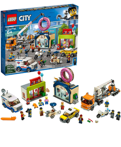 lot 13846 image: LEGO City Donut Shop Opening 60233 Store Opening Build and Play with Toy Taxi, Van and Truck with Crane, Easy Build with Minifigures for Boys and Girls (790 Pieces)
