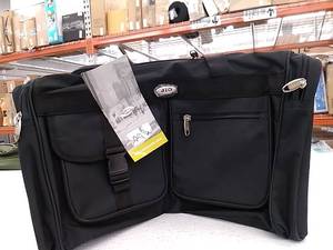 lot 6734 image: Jio bag, Black canvas carry on. Size22X10.5X12