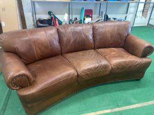 lot 1296 image: High end leather sofa, was over $2000 when purchased. Non smoking home. very nice