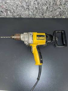 lot 1402 image: Spade Handle Dewalt drill works great
