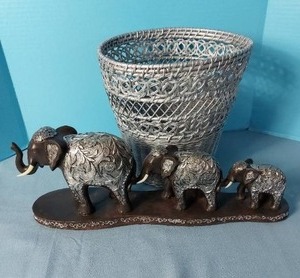 lot 32696 image: Elephant Parade with Basket