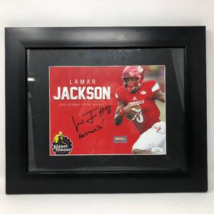 lot 36 image: Signed Lamar Jackson 8x10 Planet Fitness Advertisement with Heisman 16 Inscription and James Spence Authentication