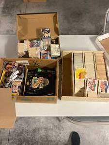 lot 142 image: Boxes Full of Mixed Sports Cards and Donruss Puzzles 5000 Cards
