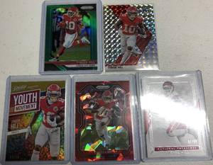 lot 175 image: Five Tyreek Hill Football Cards - One numbered to 50, National Treasures #99, Two Prizm Including Cracked Ice Red