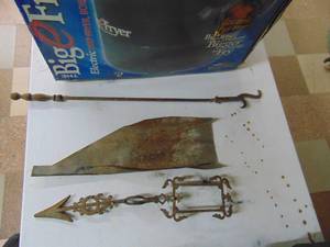 lot 1553 image: Fireplace Poker - Cast wind direction arm