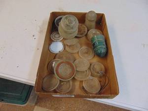 lot 1711 image: Glass Jar Lids and Insulators