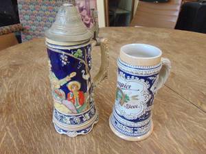 lot 1783 image: Olympia Beer Stein and Musical Beer Stein