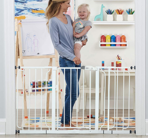 lot 10752 image: Easy Open Baby Gate, Pressure Mount with 2 Included Extension Kits, 29 in. to 47 in.