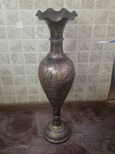 lot 1002 image: A Large Solid Brass Vase With Etched Design