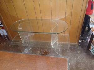lot 1018 image: Cool 2 Tiered Floating Glass Table With Fiberglass Legs