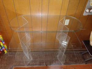 lot 1019 image: Cool 3 Tiered Floating Glass Table With Fiberglass Legs