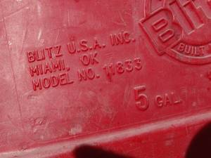 lot 1767 image: One Plastic and One Metal Jerry Can  5 Gallon Gas Cans
