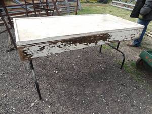 lot 1828 image: 5Ft x 30 Inch White Wood Folding Table 