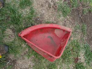 lot 1864 image: Red Plastic Corner Feed Bin