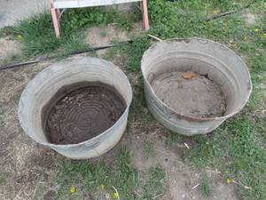 lot 1869 image: 22 Diameter Metal Feed  Water Troft  Lot of 2