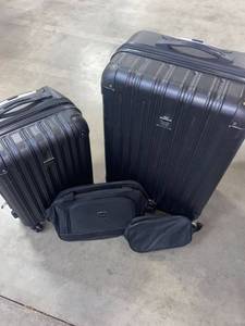 lot 10769 image: Travelers Club Midtown Hardside Lot Of 4 Travel Set