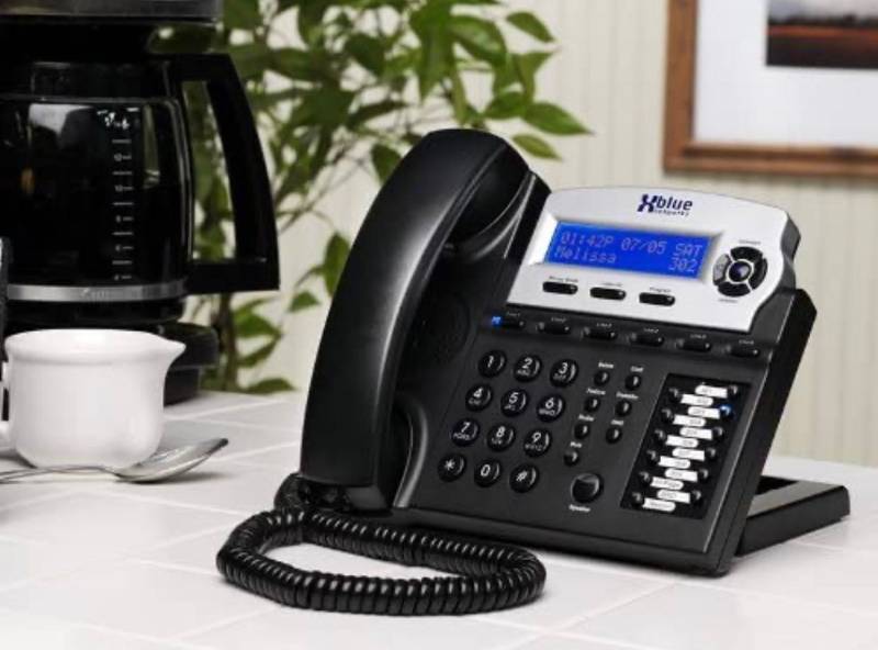lot 30447 image: Complete Office Phone System with (3) Charcoal X16 Phones & (3) Analog Line Ports (no Internet connection required). X16 systems include Automated Attendant and a Voice Mailbox for every user.