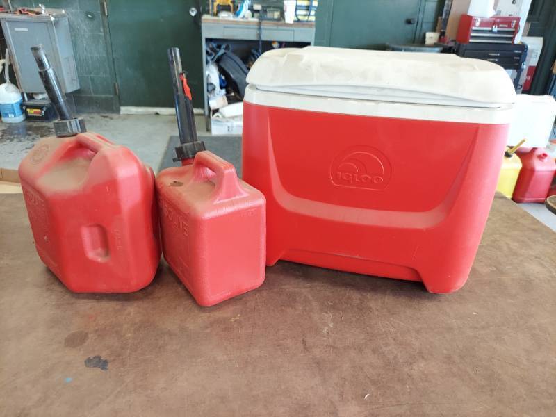 lot 7283 image: Igloo cooler and 2 gas containers