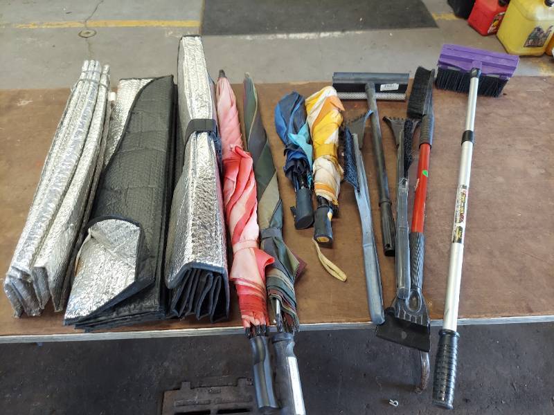 lot 7315 image: car shades,umbrellas and squeegees