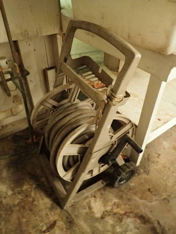 lot 2695 image: Garden Hose w Reel Cart