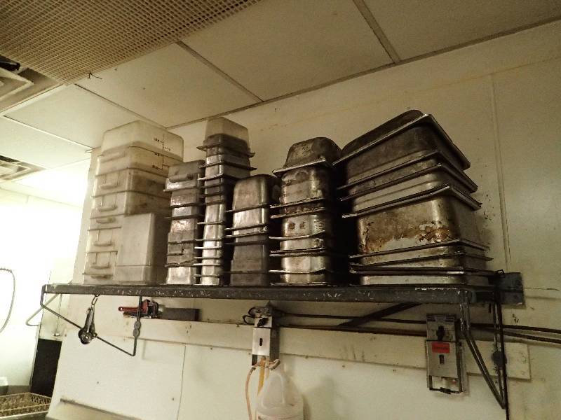 lot 2689 image: 60 Wall Mounted Metal Storage Shelf w Contents