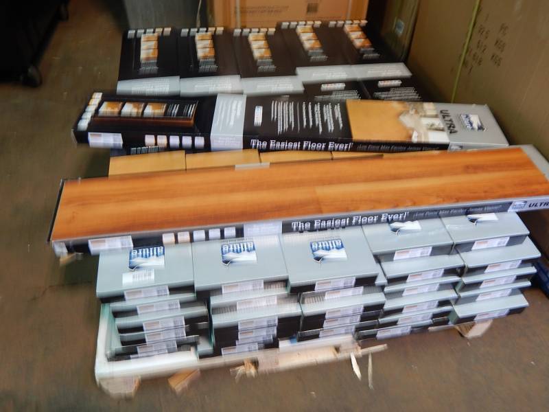 lot 1381 image: Large Lot of Allure Ultra 2 Strip Red Cherry Flooring