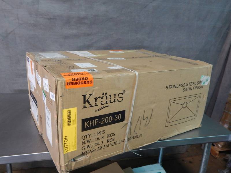 lot 1404 image: Kraus 30 Farmhouse Apron Single Bowl Stainless Steel Sink Factory Sealed