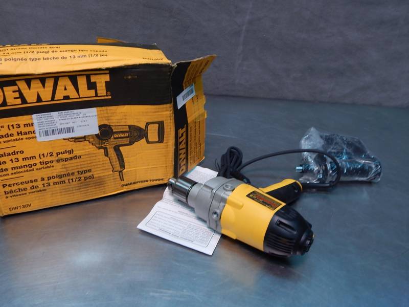 lot 1498 image: Dewalt 12 Spade Handle Drill plug in comes on