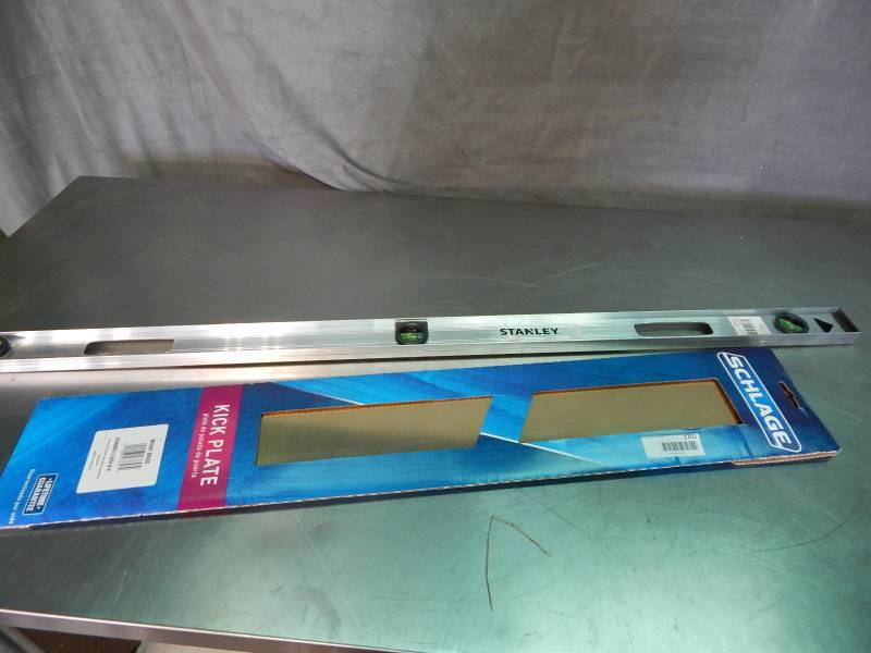 lot 1701 image: Stanley Level and Schlage Kick Plate