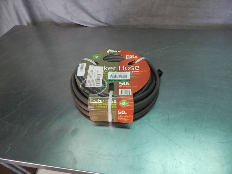 lot 1702 image: Roll of Soaker Hose