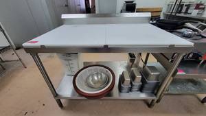 lot 6418 image: Heavy-Duty Stainless-Steel Prep Table W an Undershelf and Two White Cutting Boards