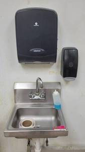 lot 27132 image: Stainless Steel Handwashing Sink W Georgia Pacific Towel Dispenser and a Soap Dispenser