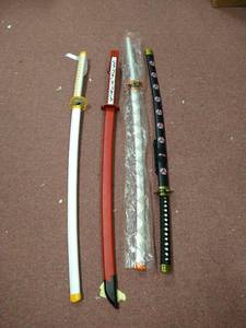 lot 1166 image: lot of 4 anime swords all have damage of some sort but could be repaired