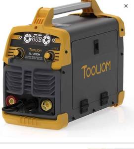 lot 10335 image: TOOLIOM 200A MIG Welder 3 in 1 Flux MIGSolid WireLift TIGStick Welder 110  220V Dual Voltage Welding Machine. Retails $309