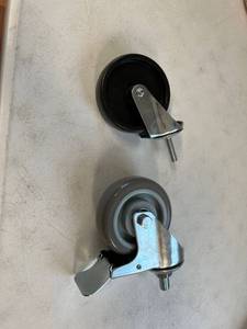 lot 10372 image: Two casters both different both look new