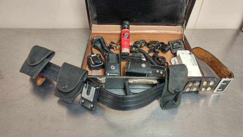 lot 72 image: Briefcase with Officers Belt, Mace, and Misc Accesories