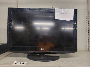 lot 38035 image: 32 LG Television on Stand - No Chord