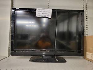 lot 38080 image: Phillips 42 Television on Stand with Chord