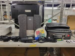 lot 38114 image: HP Projector with Accessories