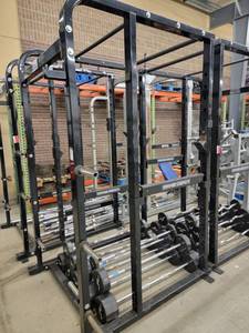 lot 39105 image: Hammer Strength Enclosed Squat Rack With Weight Tree Attached