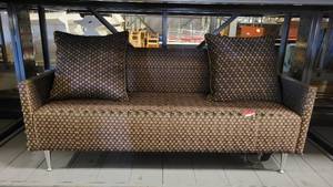 lot 38576 image: Unique Brown Couch W Metal Legs and Two Pillows
