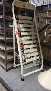 lot 38677 image: Rolling Slanted Metal Display Cart - Circulating Display Rack