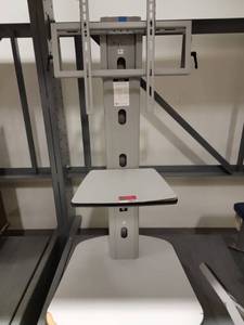 lot 38833 image: Presentation TV Stand With Rolling Base